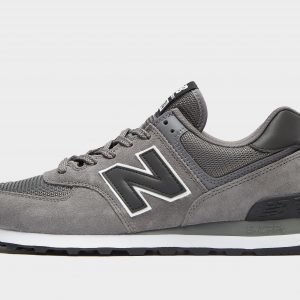 New Balance 574 Tummanharmaa