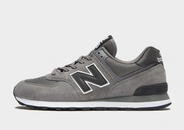 New Balance 574 Tummanharmaa